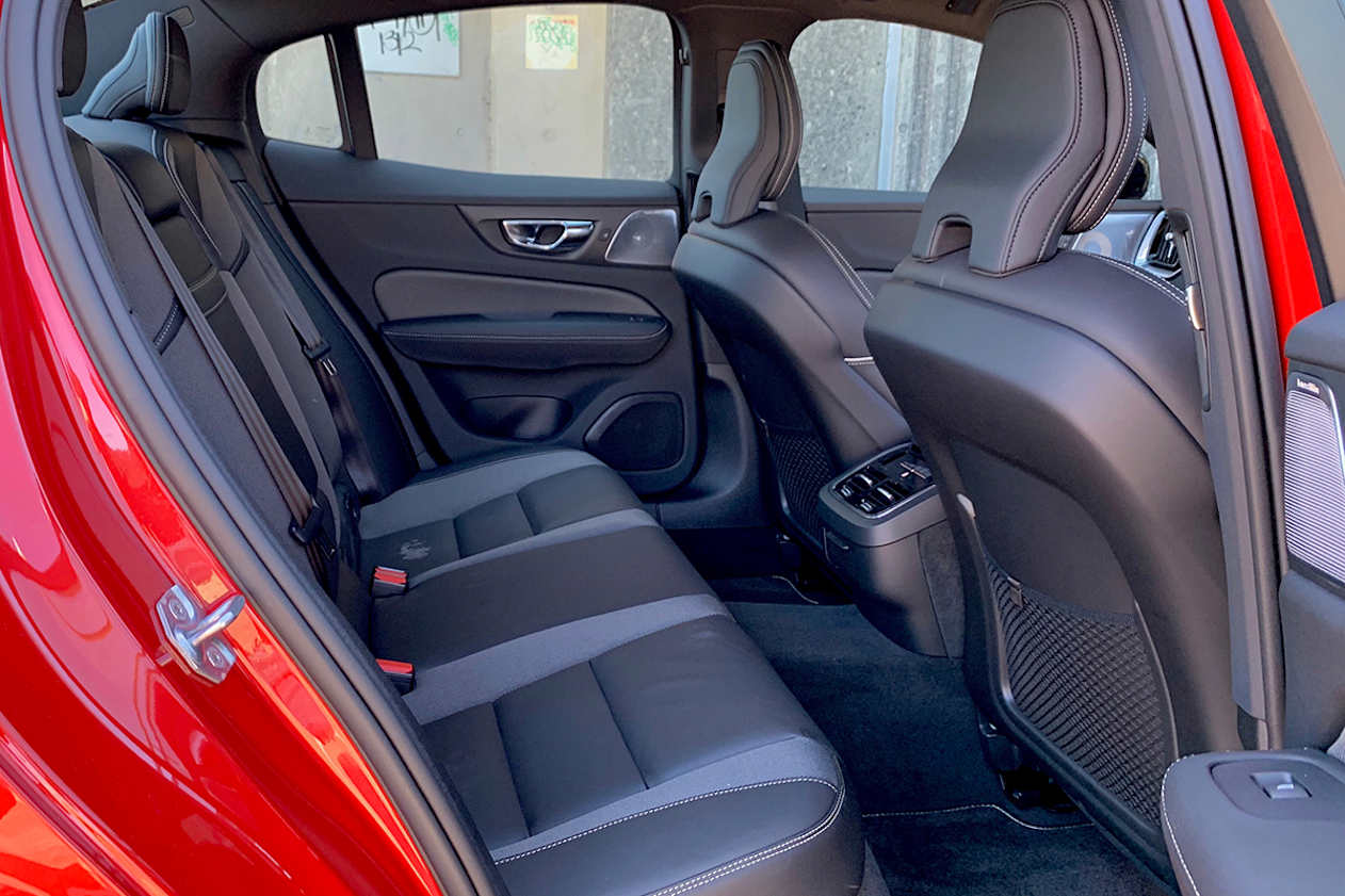 The storage in the cabin is okay, with a covered centre bin, bottle holders in all four doors, and a rear flip-down armrest with cupholders.